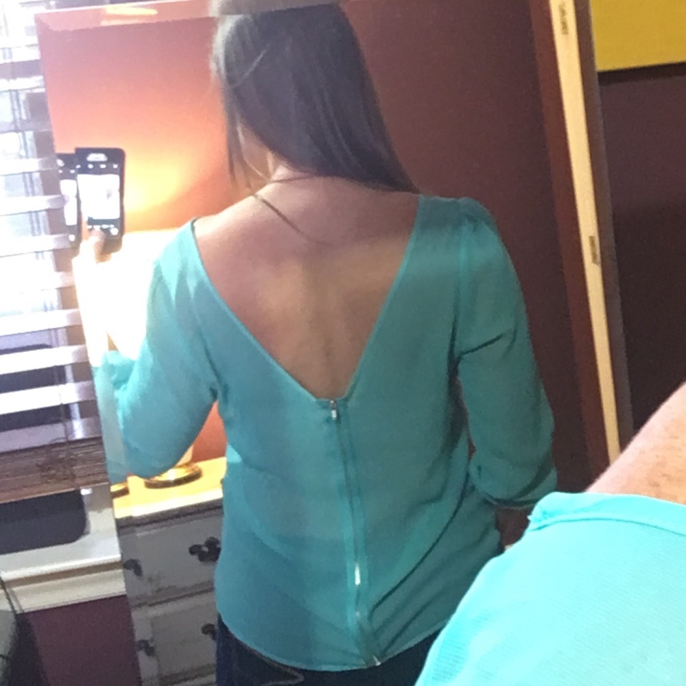Sheer mint/aqua colored blouse